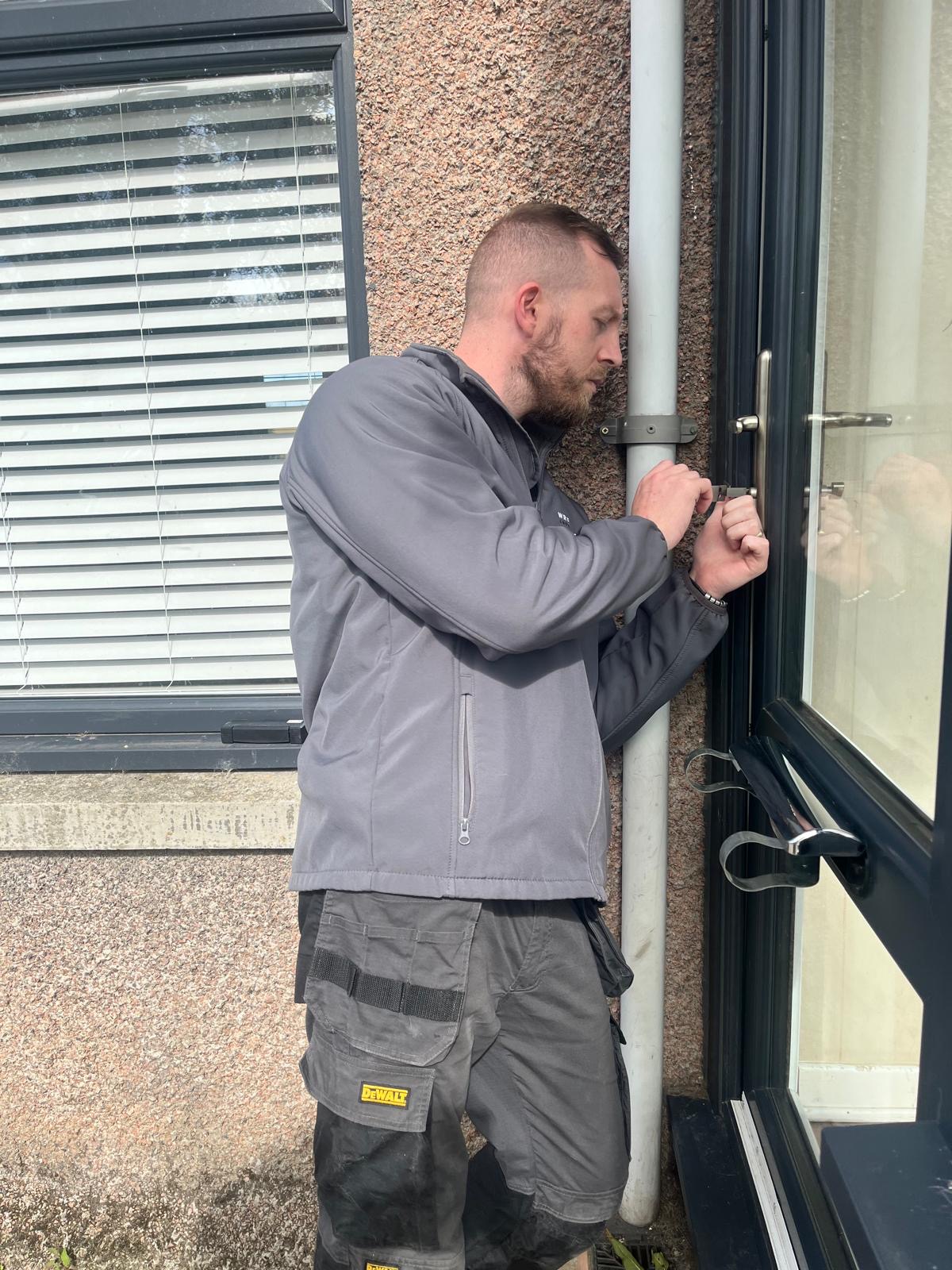 Darren repairing locks on site